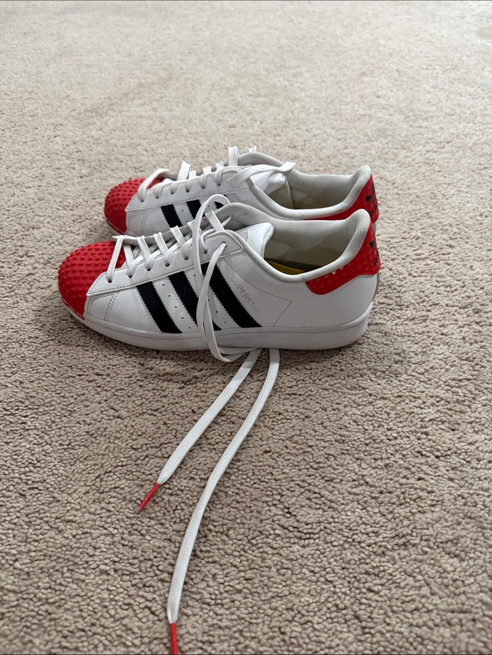 adidas Kids White Sneakers with Black Stripes and Red Accents